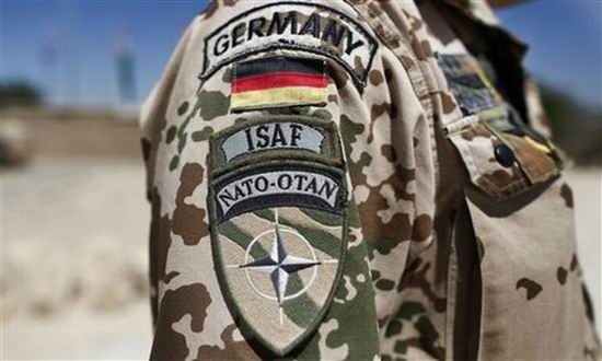 Germania reduce numarul militarilor din Afganistan