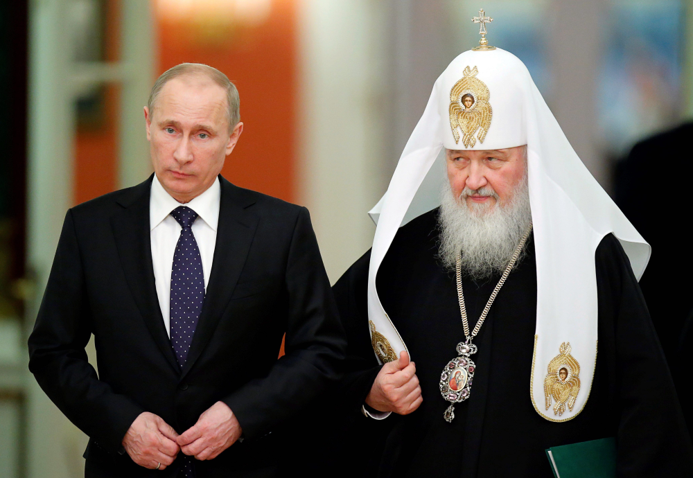 Presedintele rus Vladimir Putin și patriarhul Bisericii Ortodoxe Ruse Kirill, un tandem politic redutabil